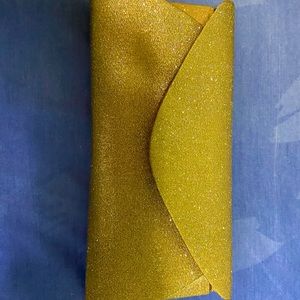Gold shimmery clutch